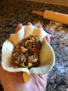 Steamed Bao Folding - pinch center bottom edges together